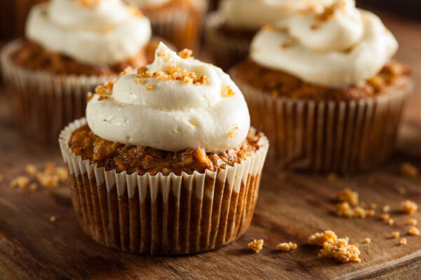 Homemade carrot cake muffins with cream cheese frosting