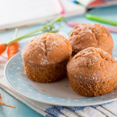 Gluten-free carrot cake muffins on a plate