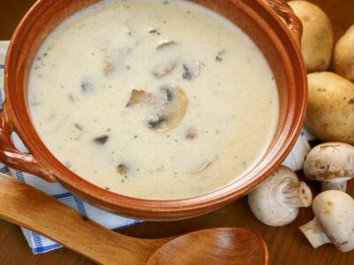 A bowl of hearty gluten-free walnut and mushroom soup