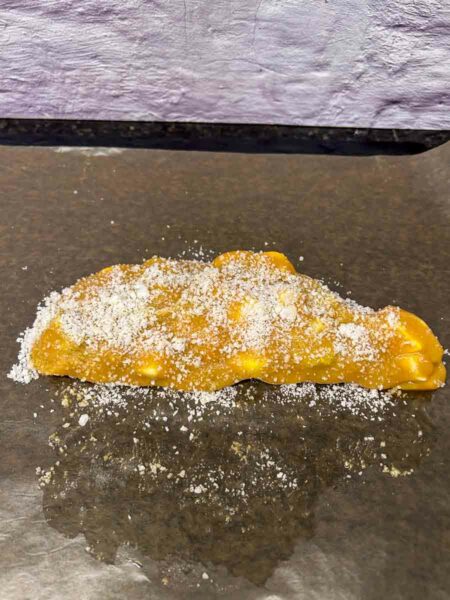 Lolly cake log sprinkled with desiccated cocont