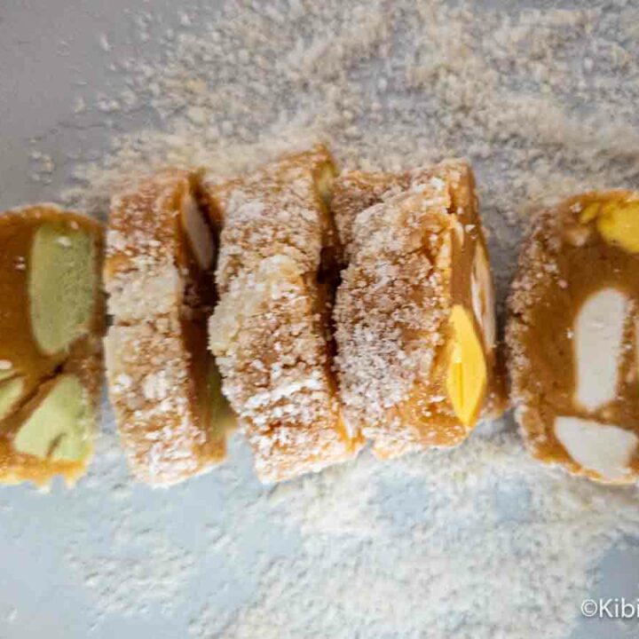 A sliced gluten-free lolly cake on a plate