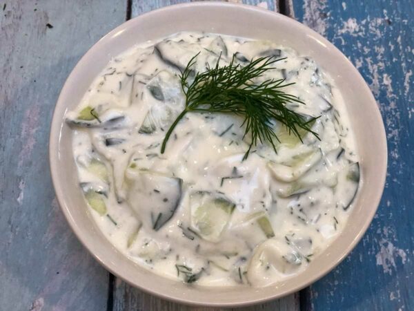 A bowl of tzatziki on a Mediterranean mezze platter