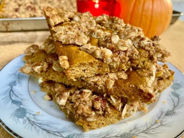 Slices of pumpkin sheet pan pancakes on a plate