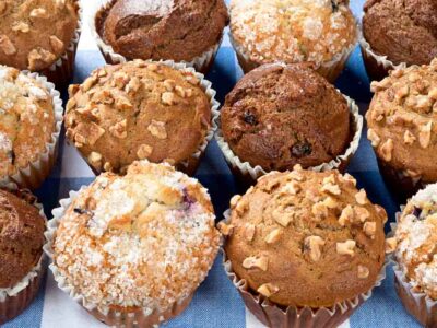 Gluten-free muffin recipes prepared including chocolate chip, blueberry, and nut muffins