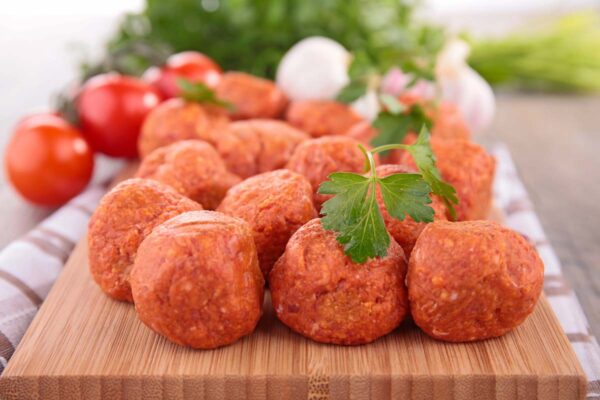 Raw meatballs ready to cook